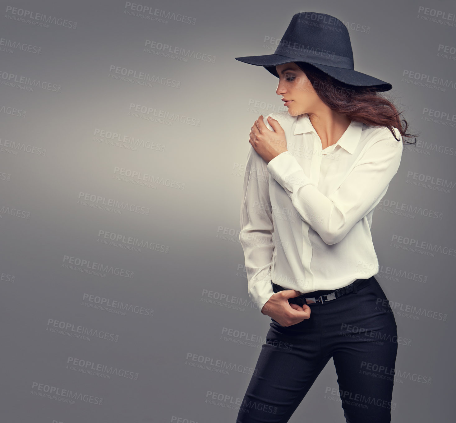 Buy stock photo Hat, fashion space or woman in studio with a cool, trendy formal shirt or comfortable outfit mockup. Profile, clothes or female model with confidence in cosy, style or clothing on grey background