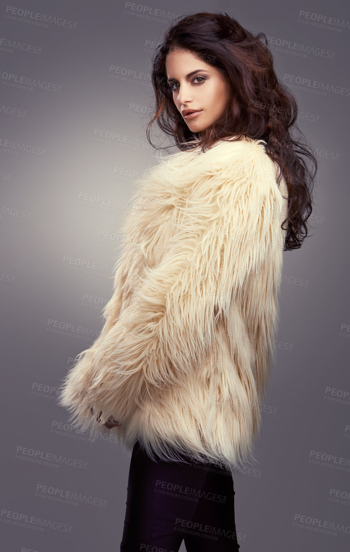 Buy stock photo Fur coat, winter or woman in studio or portrait for cool style, trendy jacket or comfortable outfit. Chic, lady or model with satisfaction in cozy fashion wear or casual clothing on grey background 