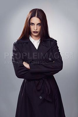 Buy stock photo Coat, fashion or woman in portrait with arms crossed in cool style, trendy jacket or comfortable outfit. Chic lady, studio or confident model in cozy wear or elegant winter clothes on grey background