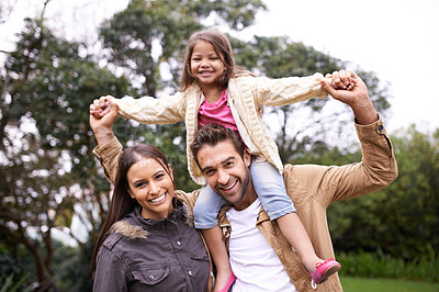 Buy stock photo Mom, dad and child in portrait in park with love, bonding and support at outdoor family adventure. Smile, parents and girl on playful walk in garden together with happy man, woman and kid in nature