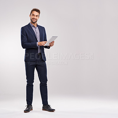 Buy stock photo Businessman, smile and confident with tablet in studio on white background for startup company as salesman. Portrait, entrepreneur and happy to browse internet, website and network with mockup 