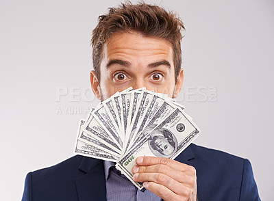 Buy stock photo Face, man and money for investment in studio on white background with cash for business and funding. Portrait, happy and entrepreneur with paper notes or finance for  startup company and growth