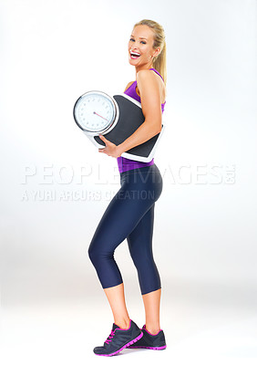 Buy stock photo Woman, portrait and scale in studio for results, smile and excited for progress of diet or detox. Female person, laugh and happy for calories burned target or goals, wellness and white background