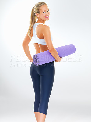 Buy stock photo Woman, portrait and yoga mat with fitness style and happy in a studio with gym gear. Health, outfit and female person with pilates and white background and confidence ready for wellness class