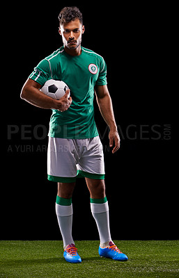 Buy stock photo Man, ball and portrait for soccer, sport and match for fitness  game and active for sportswear on grass or field. Professional or athlete and training with kit for competitive on dark background