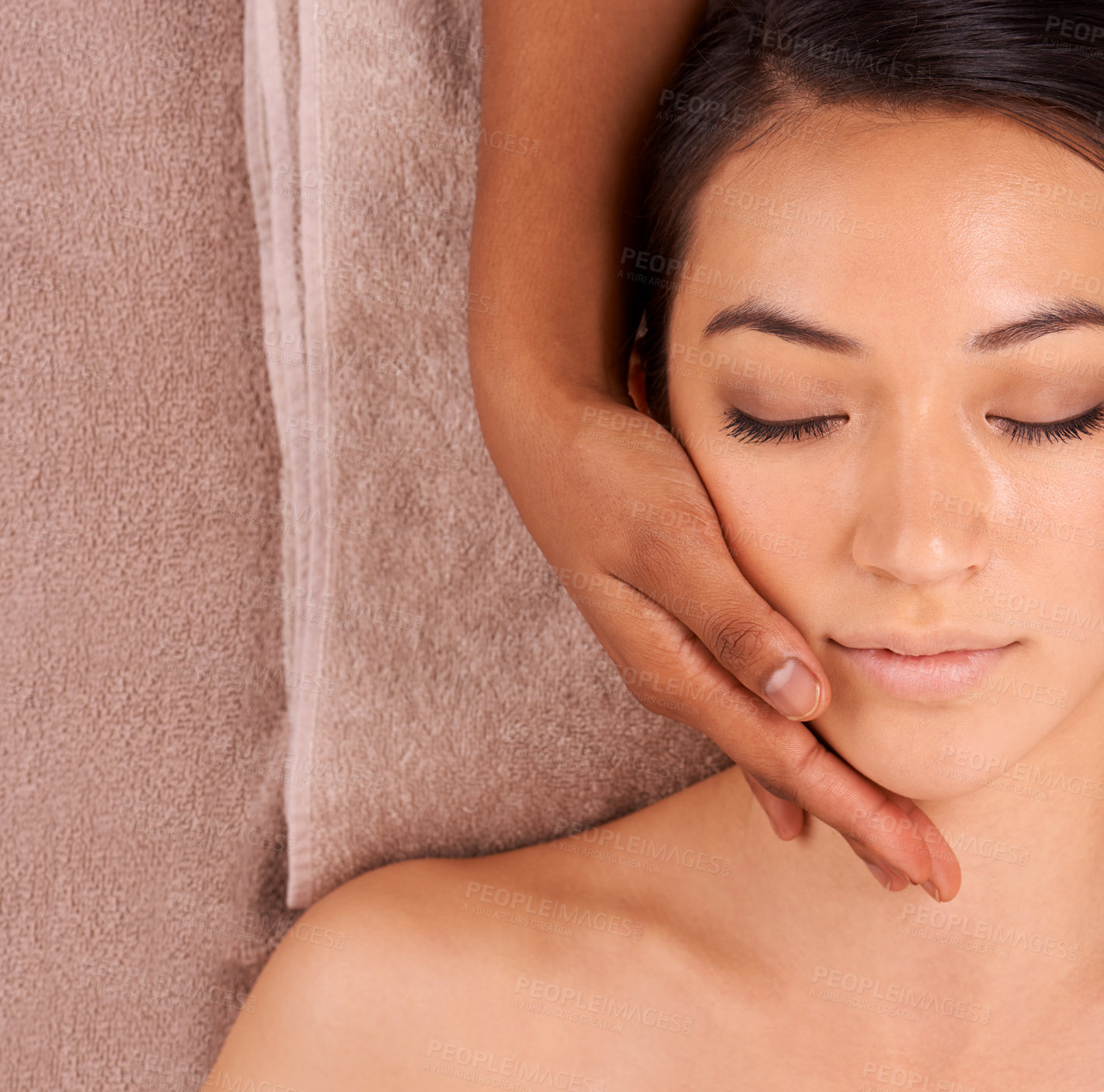 Buy stock photo A beautiful young woman enjoying a massage at the spa