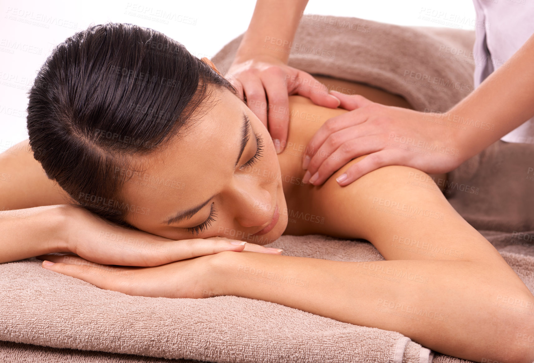 Buy stock photo Shot of a beautiful young woman enjoying a relaxing massage