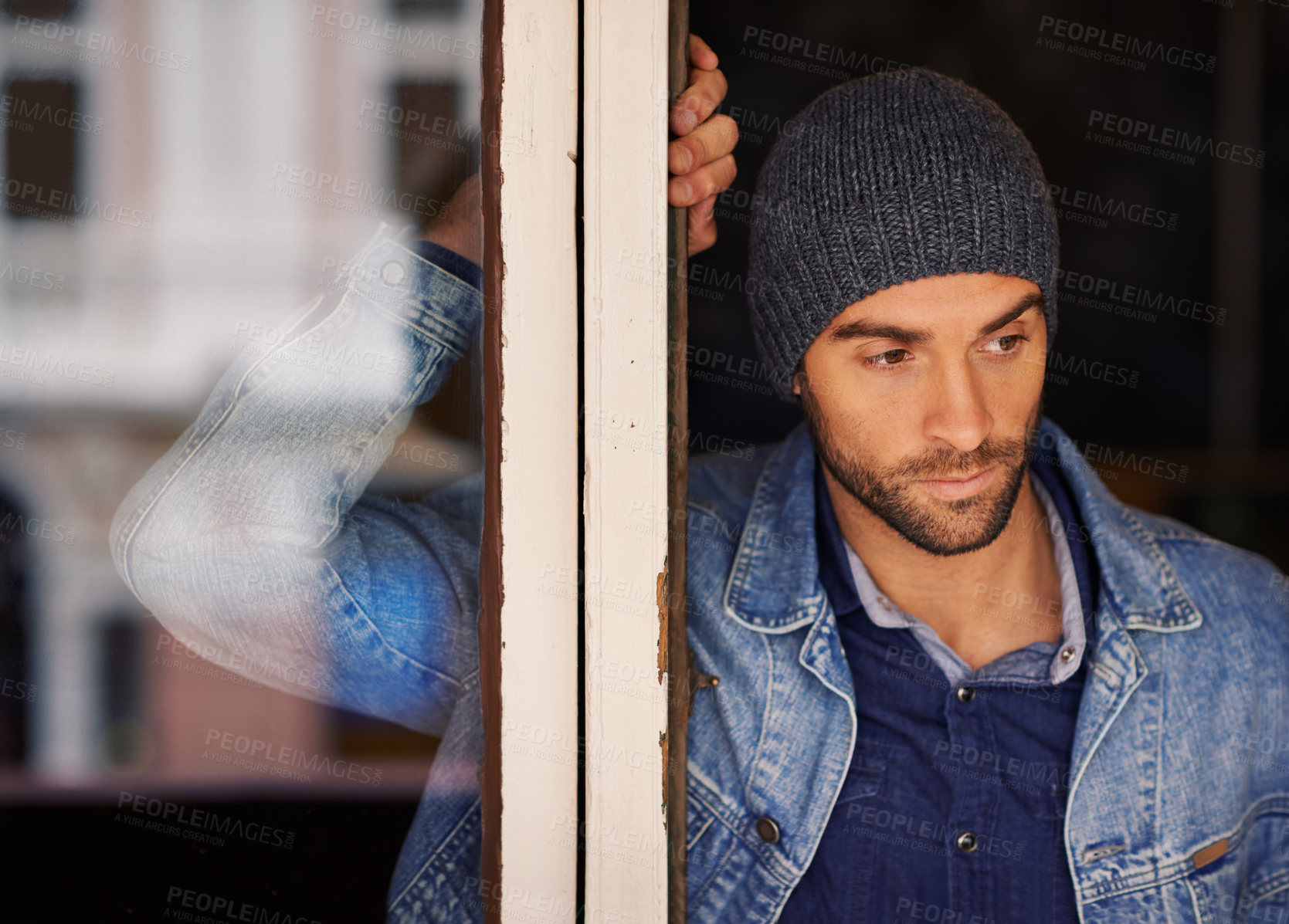 Buy stock photo Man, window and thinking with fashion for dream, vision or memory in wonder or thought at home. Handsome male person or hipster looking out glass frame with beanie or denim clothing at the house