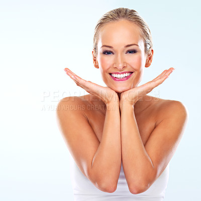 Buy stock photo Portrait, beauty and skincare of happy woman in studio for glow, shine or healthy skin isolated on a blue background mockup. Face, smile and model in makeup, cosmetics or facial dermatology for body