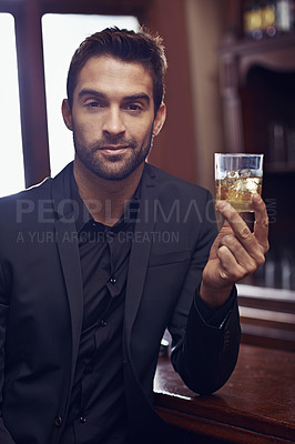 Buy stock photo Portrait, alcohol and businessman indoor to relax and formal fashion for professional in city. Entrepreneur, face and person with glass of whisky for rest, drink and ambition in startup career