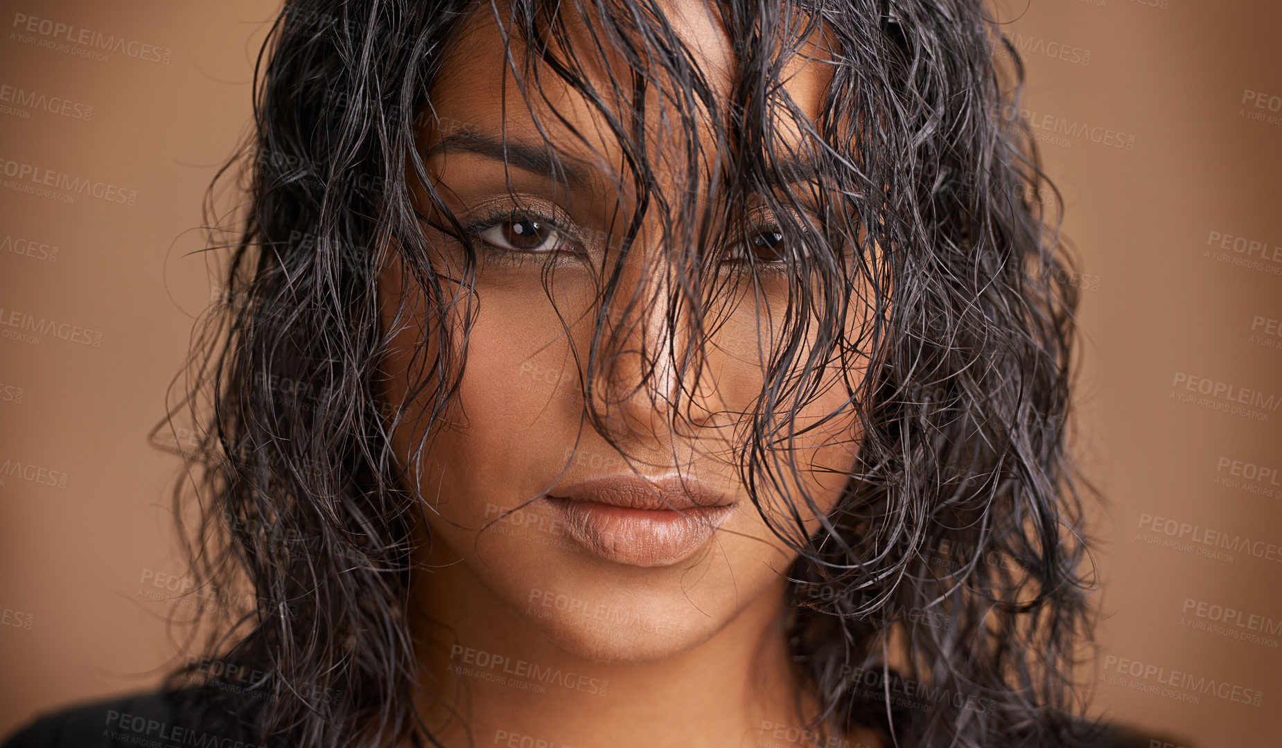 Buy stock photo Wet hair, portrait and Indian woman in studio for beauty, wellness or shine cosmetics on brown background. Haircare, cleaning or calm female model face with shampoo, results or scalp detox treatment