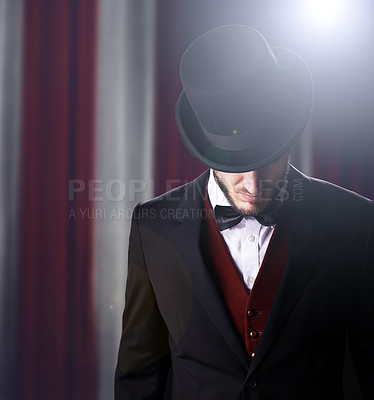 Buy stock photo Shot of a magician at a carnival performance