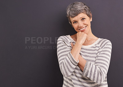 Buy stock photo Portrait, smile and elderly woman with retirement, happiness and casual outfit on a grey studio background. Face, pensioner and old person with mockup space and cheerful with trendy clothes or joyful