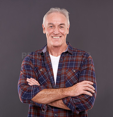 Buy stock photo Senior, fashion and man in portrait with arms crossed, confidence or modern style on grey background. Proud person, casual model and happy mature guy in studio with smile, clothes or pride in England