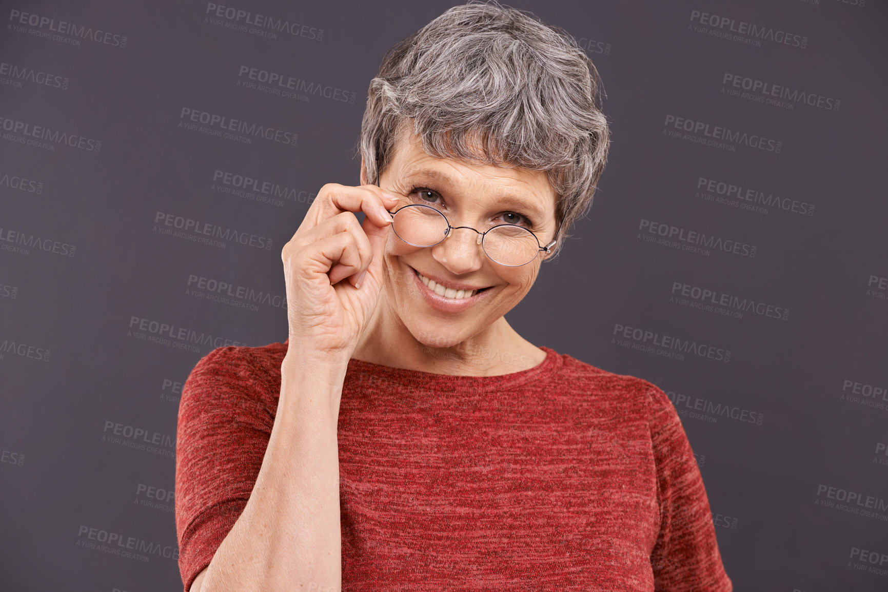 Buy stock photo Happy, portrait and senior woman with glasses in studio for vision, optometry or frame sale on grey background. Eye care, testing or face of old lady model smile for pensioner, spectacles or discount
