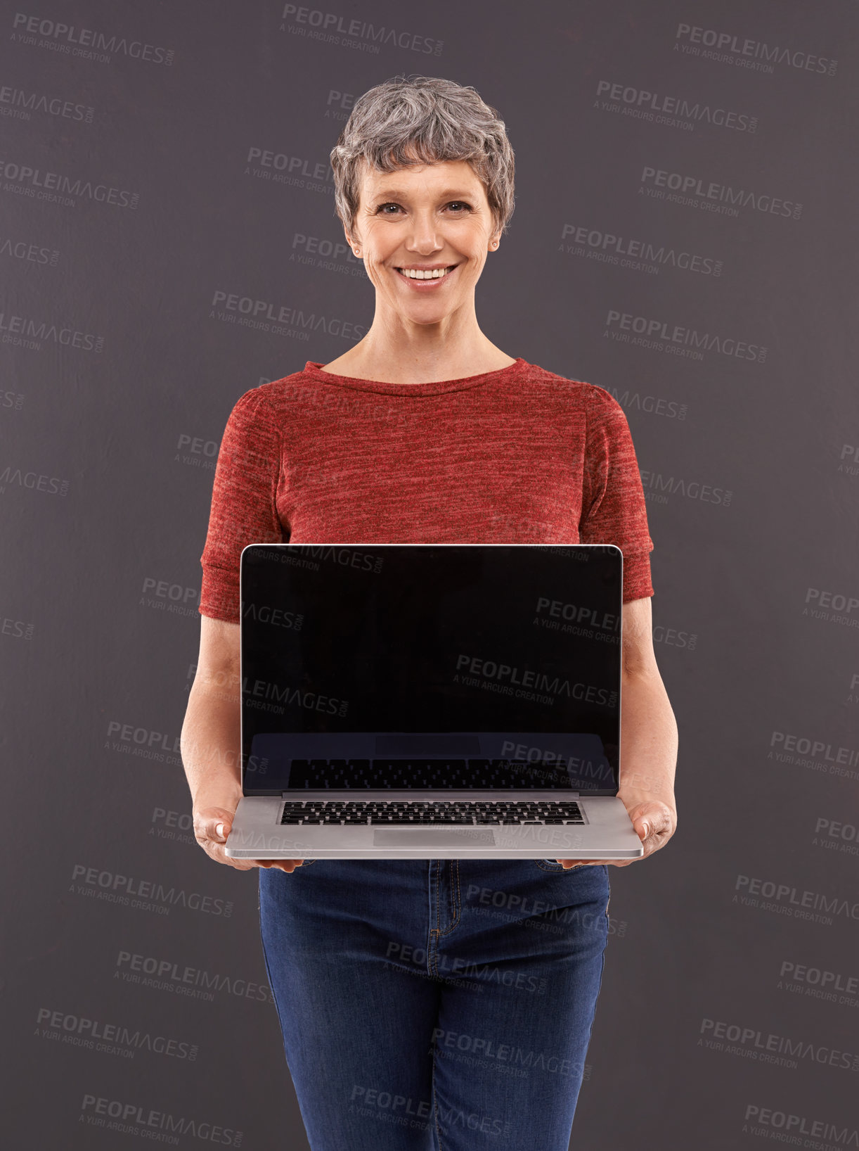 Buy stock photo Elderly, woman and laptop screen in studio with smile, technology and online search or typing and internet connection. Information, browse or social network, senior female person on mockup background