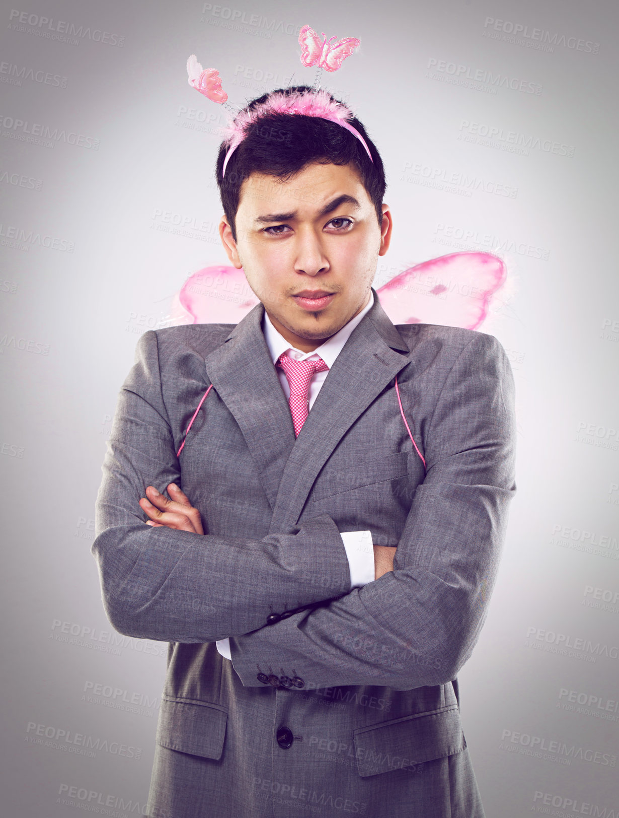 Buy stock photo Studio, portrait and man as fairy for magic in Halloween party of startup up business and company. Adult, guy and male person with professional suit, costume and frown on face with arms crossed