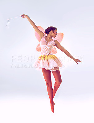 Buy stock photo Woman, fairy and ballerina for dancing in studio for fantasy, flight and moving by white background. Person, dancer and girl with magic, costume and butterfly wings for ballet, art and creativity