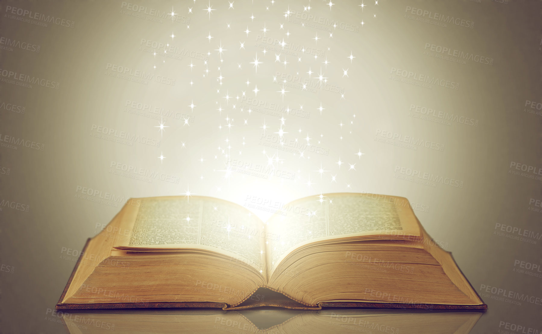 Buy stock photo Magic, glowing pages and story with book, sparkle and literature on a grey studio background. Empty, education and art with creativity and lights with novel and knowledge with astrology and fantasy