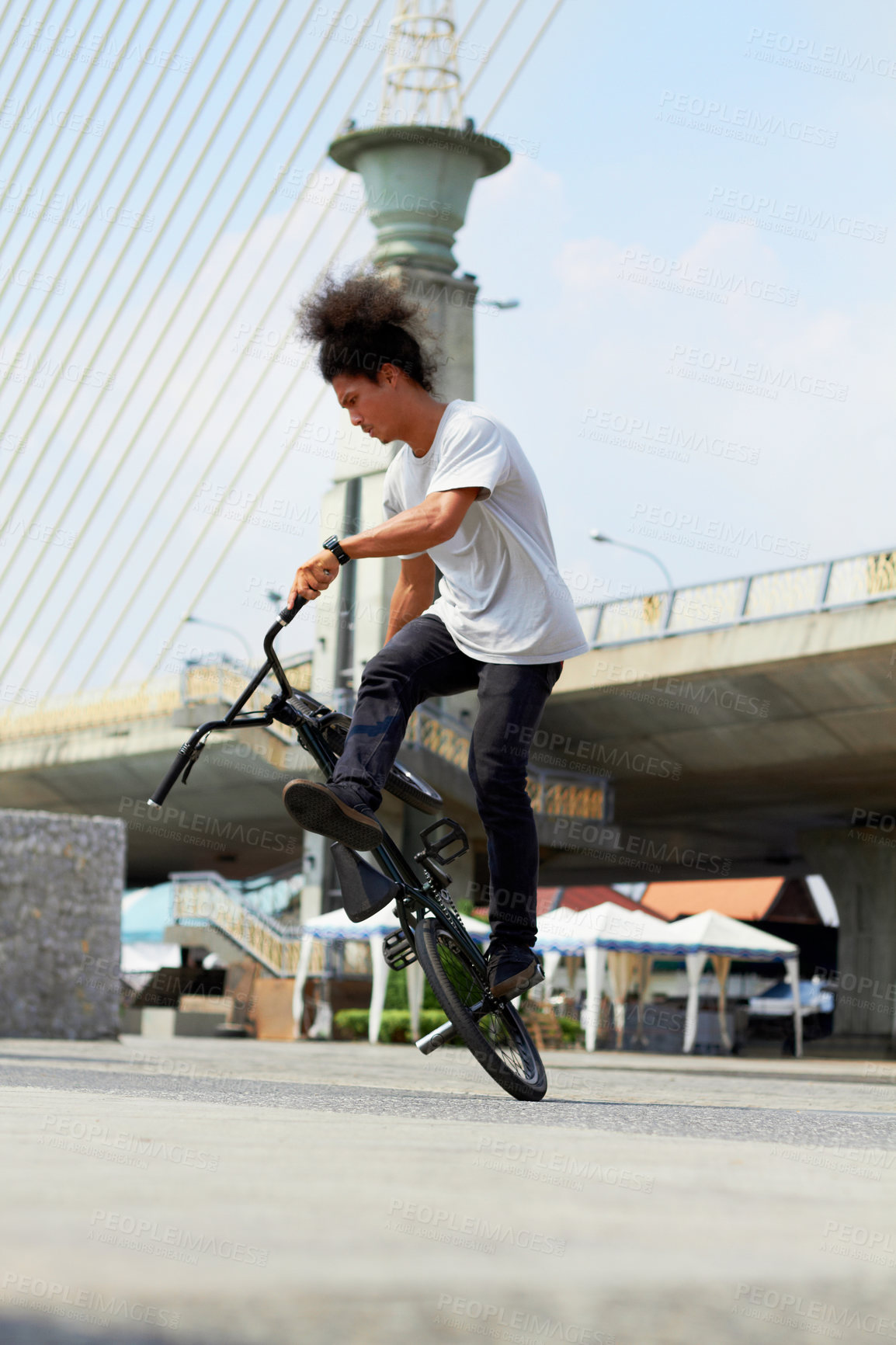 Buy stock photo Urban, trick and man jump with bicycle for sports, balance and action in city street. Gen z male person, cycling stunt and challenge of biker in town for skill, performance risk and freedom of motion