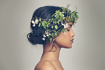 Buy stock photo Studio shot of a beautiful young woman wearing a head wreath