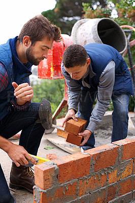 Buy stock photo Shot of bricklayers at work