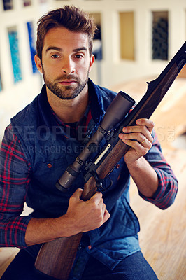 Buy stock photo Portrait of a hunter posing with his rifle