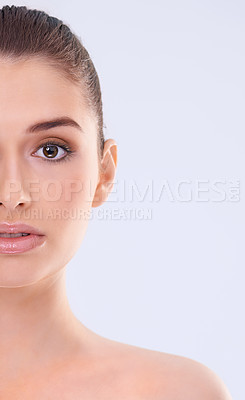 Buy stock photo Beauty, skincare and half portrait of woman with confidence, mockup and facial cosmetics in studio. Dermatology, health and face of girl with natural makeup, glow and skin care on white background