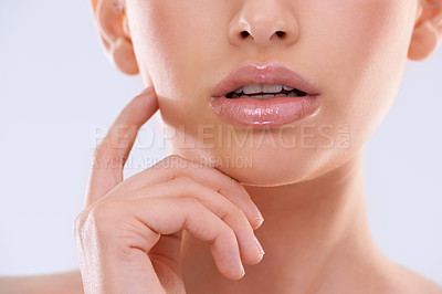 Buy stock photo Cropped studio shot of a young woman with beautiful skin