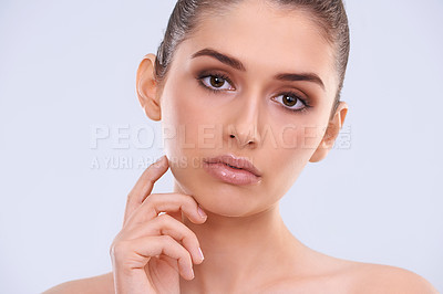Buy stock photo Beauty, skincare and portrait of woman with serious face, confidence and benefits of cosmetics in studio. Dermatology, health and girl with natural makeup, glow and skin care on white background