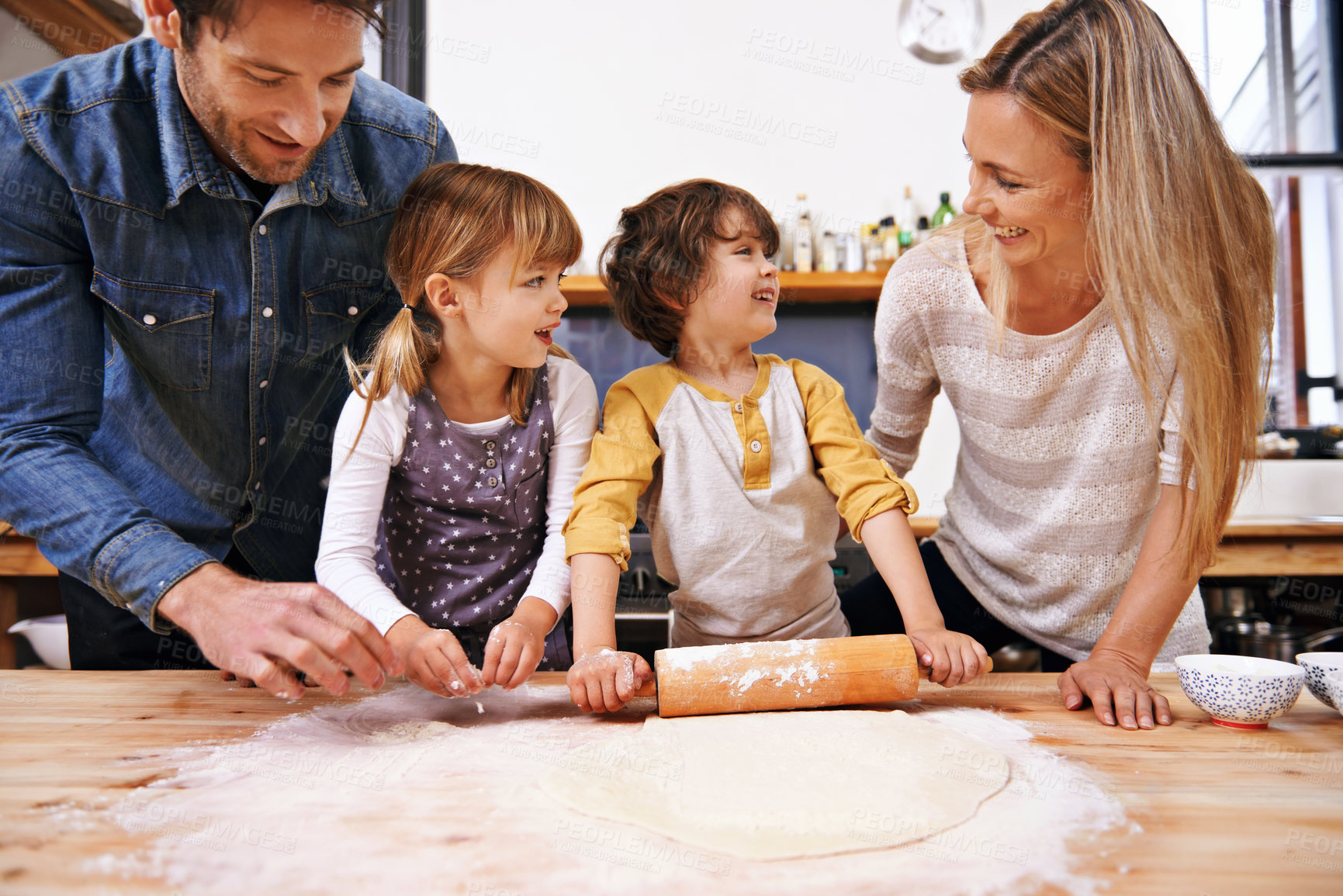 Buy stock photo Parents, children and dough in kitchen for pizza, young and growing up for adolescent and ingredient. Mother, father and kids with flour and smile for food and roll for fun and joy in holiday