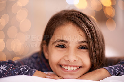 Buy stock photo Kids, portrait and happy girl relax in a house for vacation, resting or break with light and bokeh background. Face, smile and innocent female child person in a living room for holiday or weekend 