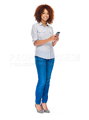 Buy stock photo Studio shot of an attractive young woman using a cellphone isolated on white