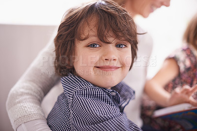 Buy stock photo Smile, portrait and boy child on sofa with mom for bonding, support and fun together in home. Story, mother and face of kid on couch for family development, relax and happy children in living room