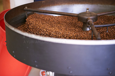 Buy stock photo Coffee beans, machine and factory for roast, product and cooling tray for flavor, export or quality assurance. Plant, metal container and caffeine manufacturing with organic stock for sustainability