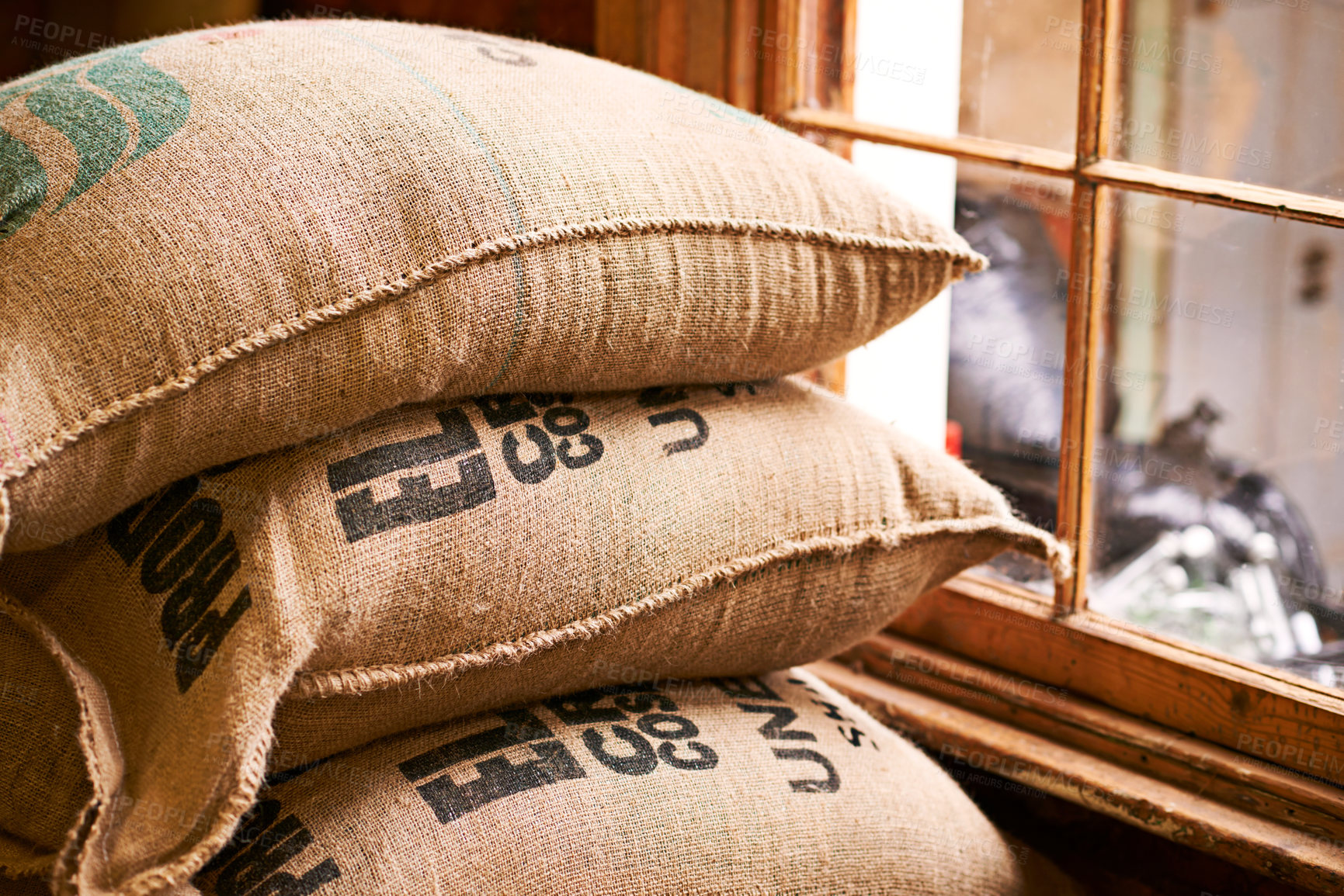 Buy stock photo Shot of a burlap sack full of unprocessed coffee beans