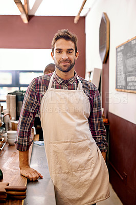 Buy stock photo Man, barista and portrait in a coffee shop with smile for service, catering and job at restaurant. Waiter, person or entrepreneur in cafeteria with apron, food and happy for small business in Italy