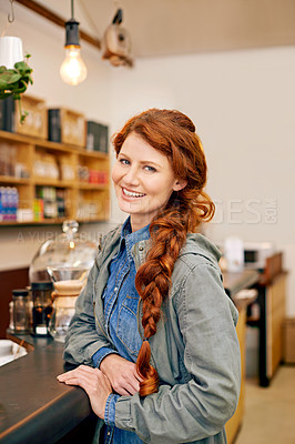 Buy stock photo Woman, smile and portrait in morning at cafe with confidence, pride and waiting for drink at counter. Girl, person and happy customer at trendy coffee shop for cappuccino, latte or espresso in Italy