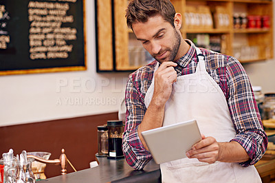 Buy stock photo Man, barista and tablet for reading in cafe with ideas, thinking and decision for online menu. Person, waiter and digital touchscreen for solution, problem solving or order on website in coffee shop