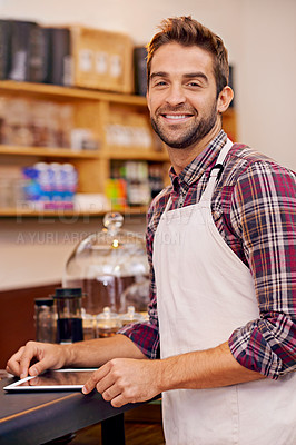 Buy stock photo Man, barista and tablet for portrait in cafe with smile, pride and catering service at startup. Person, waiter and business owner on digital touchscreen for stock, ecommerce and order in coffee shop