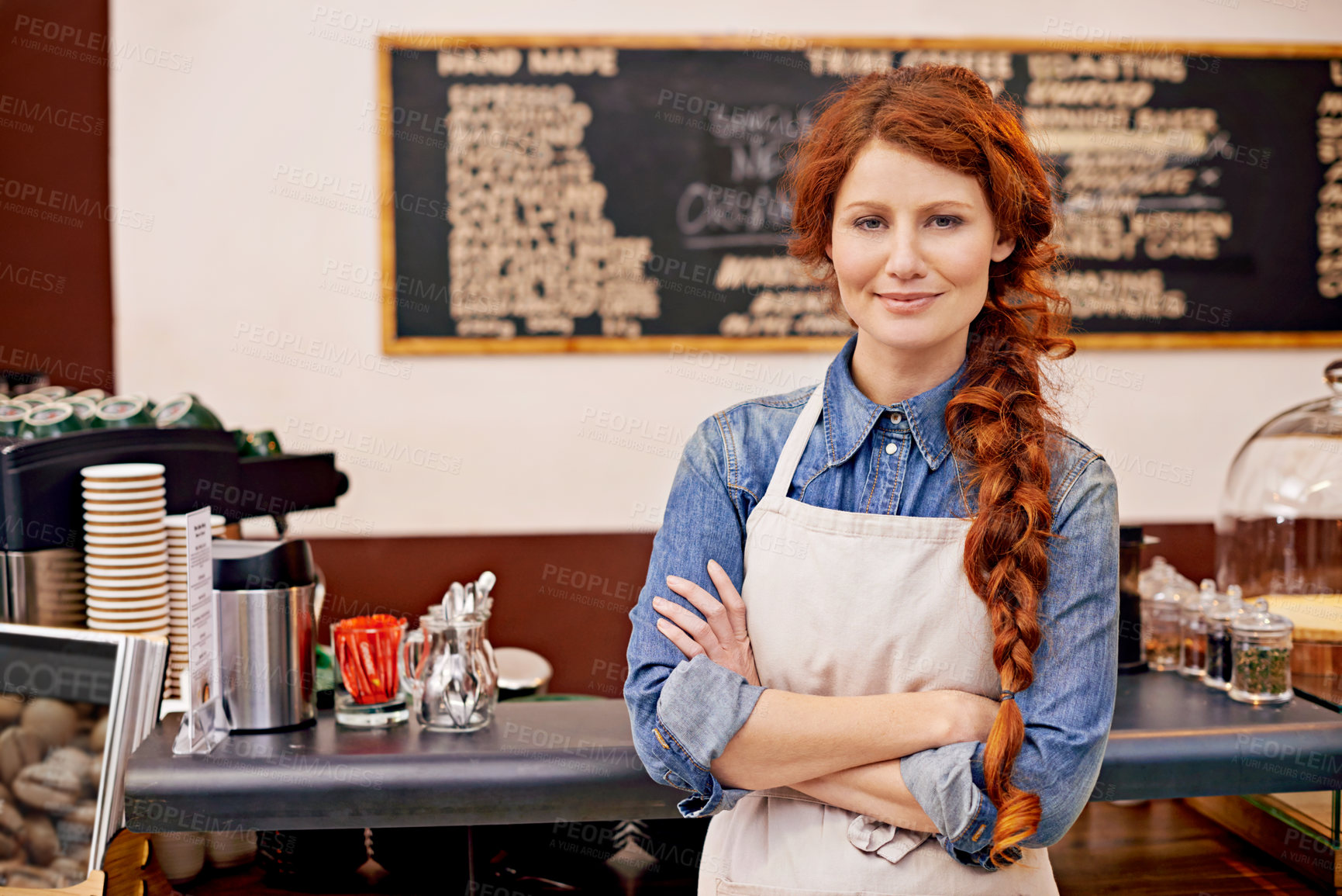 Buy stock photo Portrait, woman and barista with arms crossed, cafe and happiness with startup success, business and growth. Face, female employee and happy entrepreneur in a coffee shop, restaurant and development