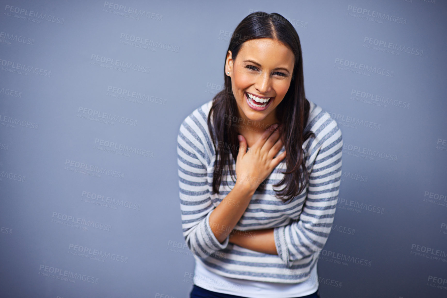 Buy stock photo Woman, positive and laugh in studio portrait for funny joke, humor and comedy on blue background. Female person, mockup space and smile for comic satisfaction, confidence and silly or goofy enjoyment
