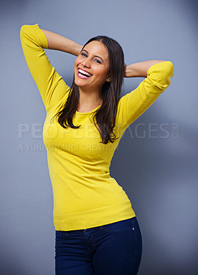 Buy stock photo Woman, laughing and fashion in studio for portrait with arms raised, excited and happy by blue background. Girl, person and model with trendy style, edgy clothes and smile with confidence in Mexico