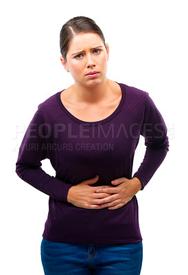 Buy stock photo Woman, stomach pain and portrait in studio with hands, period and digestion by white background. Girl, person and model with constipation, gas or abdomen with diarrhea, burnout or worry with disease