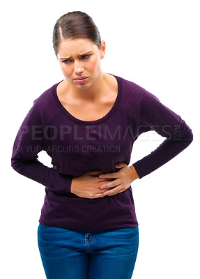 Buy stock photo Stress, anxiety and woman with stomach pain in studio for gas, constipation or pms crisis on white background. Menstruation, cramps or female model with gut health problem, virus or endometriosis