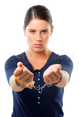 Buy stock photo Woman, portrait and handcuffs in studio for arrest of prisoner for justice of law and crime. Criminal or thief, serious for custody and restrained for jail for illegal counterfeiting in Venezuela