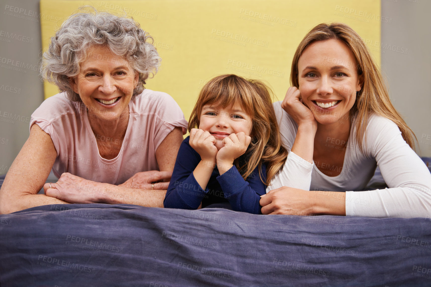 Buy stock photo Kid, mother and grandmother in bed with child, support and bonding together with a smile. Happy, family and love with mom in the morning in a girl bedroom with youth in a house with grandparent