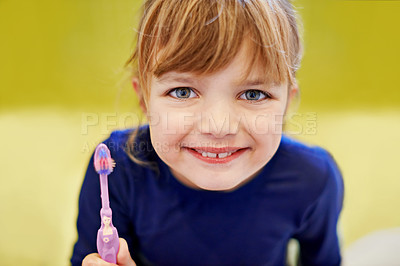 Buy stock photo Girl, portrait or kid in home brushing teeth with smile or development or morning routine in bathroom. Face, learning or happy child cleaning mouth with toothbrush for dental, wellness or oral health
