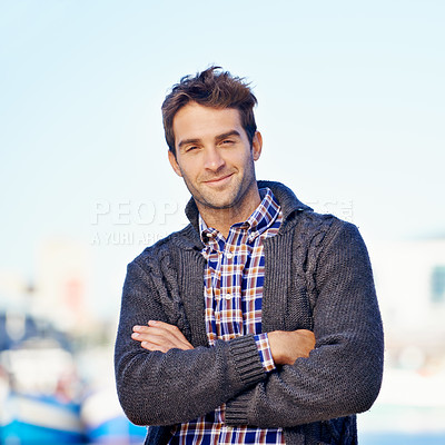 Buy stock photo Smile, crossed arms and portrait of man at harbor on travel for vacation, adventure or holiday. Happy, outdoor and confident person by sea port on weekend trip in Cape Town with positive attitude.