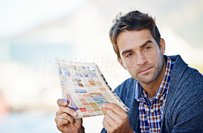 Buy stock photo Thinking, newspaper and man in outdoor for search, job hunting and serious. Newsletter, thought and male person with ideas, decision and consideration in planning for employment opportunities